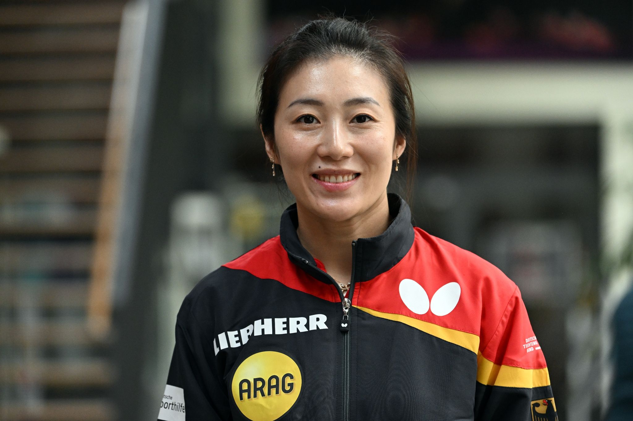 Die 40-jährige Han Ying gewann ihr Auftaktspiel bei der Tischtennis-WM in Durban.